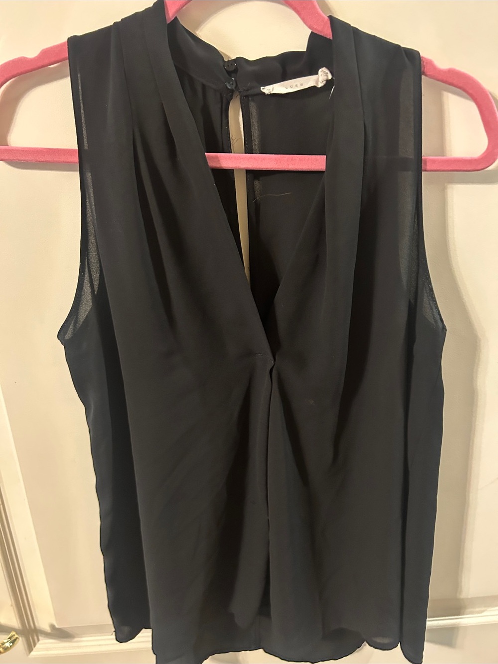 Lush sleeveless black blouse